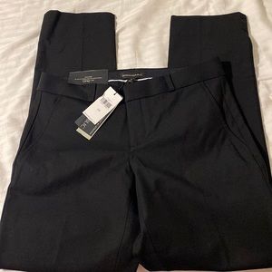 Mid rise slim fit through hip and thigh straight leg